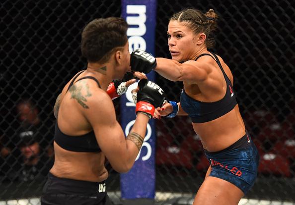 GLENDALE, AZ - APRIL 14: (R-L) Lauren Mueller punches Shana Dobson in their women's flyweight fight during the UFC Fight Night event at the Gila Rivera Arena on April 14, 2018 in Glendale, Arizona. (Photo by Josh Hedges/Zuffa LLC/Zuffa LLC via Getty Imag