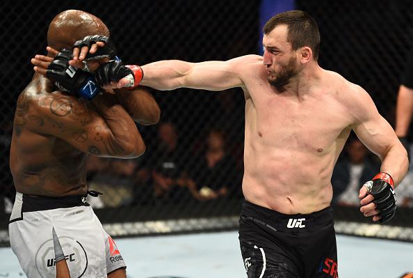 GLENDALE, AZ - APRIL 14: (R-L) Muslim Salikhov of Russia throws a spinning backlist at Ricky Rainey in their welterweight fight during the UFC Fight Night event at the Gila Rivera Arena on April 14, 2018 in Glendale, Arizona. (Photo by Josh Hedges/Zuffa