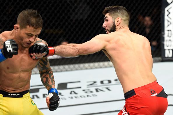 HALIFAX, NS - FEBRUARY 19:  (R-L) Aiemann Zahabi of Canada punches Reginaldo Vieira of Brazil in their bantamweight fight during the UFC Fight Night event inside the Scotiabank Centre on February 19, 2017 in Halifax, Nova Scotia, Canada. (Photo by Josh He