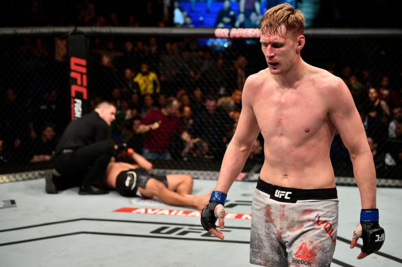 LONDON, ENGLAND - MARCH 17: (R-L) Alexander Volkov of Russia reacts after defeating Fabricio Werdum of Brazil in their heavyweight bout inside The O2 Arena on March 17, 2018 in London, England. (Photo by Brandon Magnus/Zuffa LLC/Zuffa LLC via Getty Image