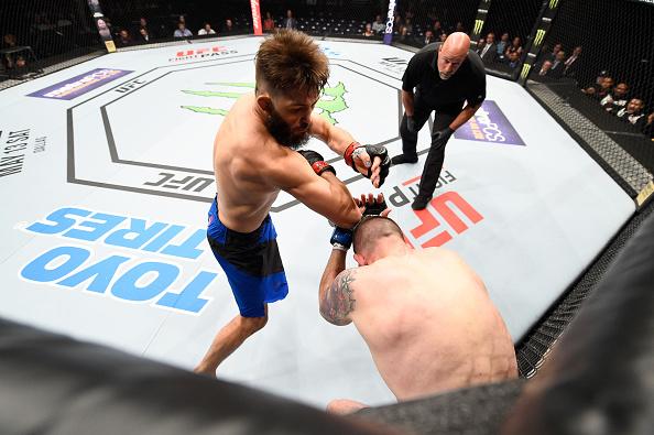 NASHVILLE, TN - APRIL 22: (L-R) Bryan Barberena throws an elbow to the head of Joe Proctor in their welterweight bout during the UFC Fight Night event at Bridgestone Arena on April 22, 2017 in Nashville, Tennessee. (Photo by Jeff Bottari/Zuffa LLC/Zuffa