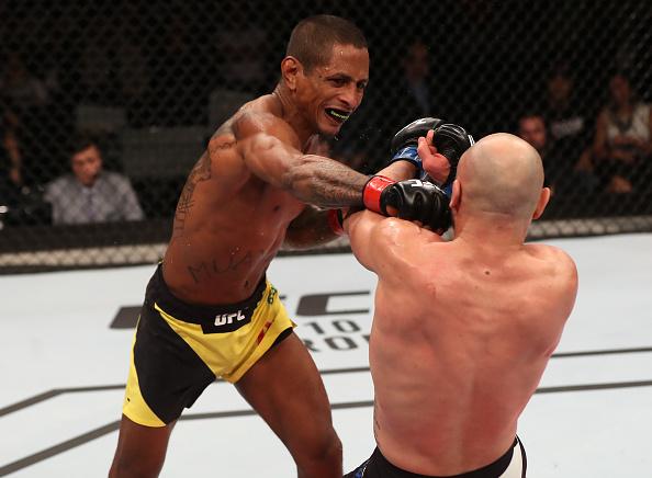 SAO PAULO, BRAZIL - NOVEMBER 19: Johnny Eduardo of Brazil punches Many Gamburyan of Armenia at the UFC Fight Night Bader v Minotouro at Ibirapuera Gymnasium on November 19, 2016 in Sao Paulo, Brazil. (Photo by Buda Mendes/Zuffa LLC/Zuffa LLC via Getty Ima