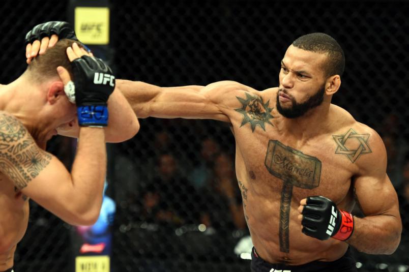 SAO PAULO, BRAZIL - OCTOBER 28:  (R-L) Thiago Santos of Brazil punches Jack Hermansson of Sweden in their middleweight bout during the UFC Fight Night event inside the Ibirapuera Gymnasium on October 28, 2017 in Sao Paulo, Brazil. (Photo by Josh Hedges/Zu