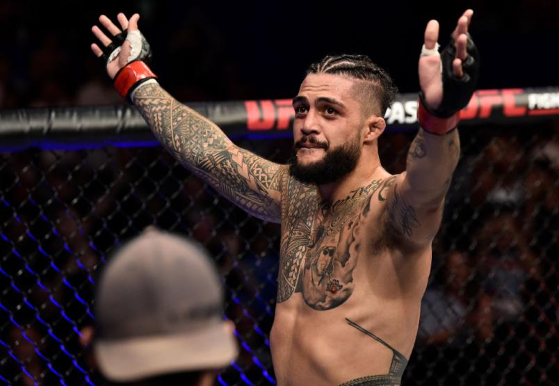 PERTH, AUSTRALIA - FEBRUARY 11:  Tyson Pedro of Australia  celebrates his submission victory over Saparbek Safarov of Russiain their light heavyweight bout during the UFC 221 event at Perth Arena on February 11, 2018 in Perth, Australia. (Photo by Jeff Bo