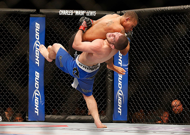 LAS VEGAS, NV - MAY 25: Khabib Nurmagomedov (blue shorts) slams Abel Trujillo in their lightweight bout during UFC 160 at the MGM Grand Garden Arena on May 25, 2013 in Las Vegas, Nevada. (Photo by Josh Hedges/Zuffa LLC/Zuffa LLC via Getty Images) ***