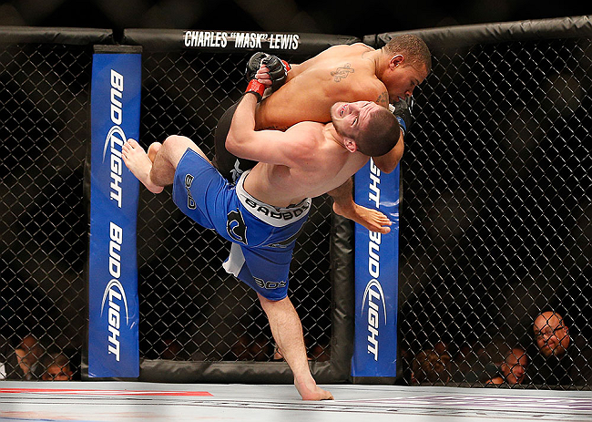 LAS VEGAS, NV - MAY 25:   Khabib Nurmagomedov (blue shorts) slams Abel Trujillo in their lightweight bout during UFC 160 at the MGM Grand Garden Arena on May 25, 2013 in Las Vegas, Nevada.  (Photo by Josh Hedges/Zuffa LLC/Zuffa LLC via Getty Images)  *** 