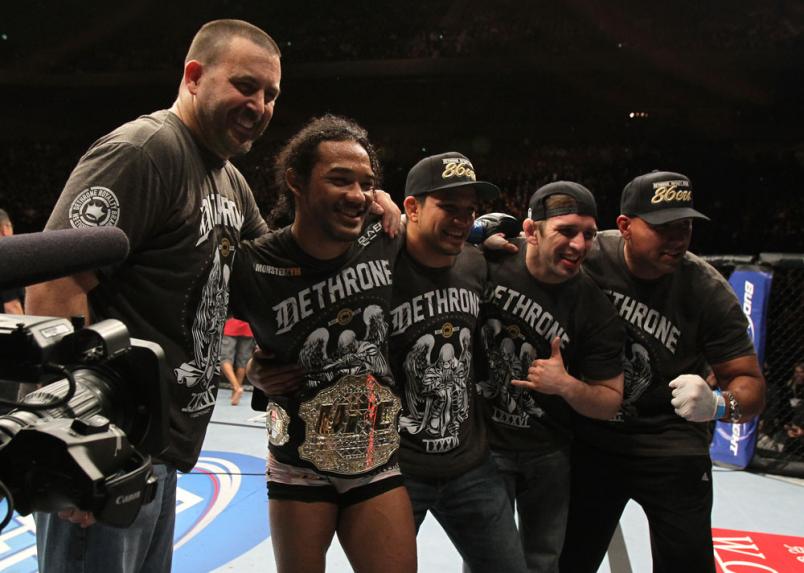 SAITAMA, JAPAN - FEBRUARY 26: Benson Henderson (second from left) poses for a photo with his team after defeating Frankie Edgar to win the UFC Lightweight Championship during the UFC 144 event at Saitama Super Arena on February 26, 2012 in Saitama, Japan