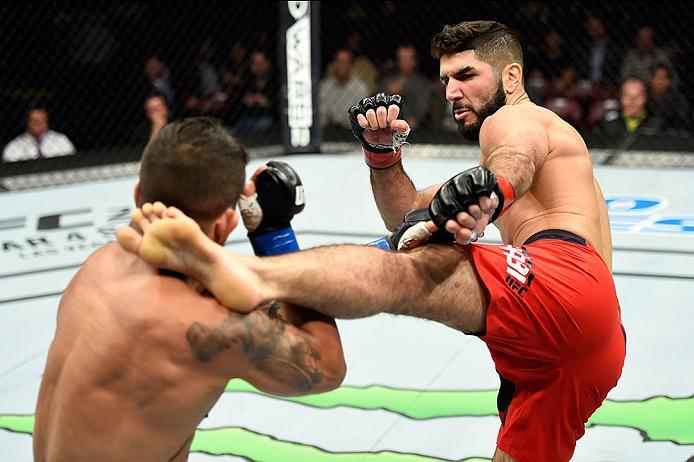 HALIFAX, NS - FEBRUARY 19:  (R-L) Aiemann Zahabi of Canada kicks Reginaldo Vieira of Brazil in their bantamweight fight during the UFC Fight Night event inside the Scotiabank Centre on February 19, 2017 in Halifax, Nova Scotia, Canada. (Photo by Josh Hedg