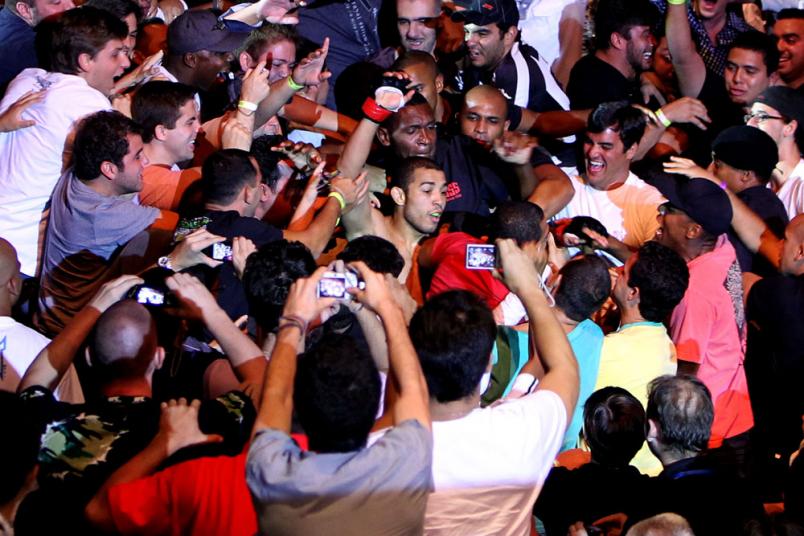 RIO DE JANEIRO, BRAZIL - JANUARY 14: Jose Aldo (C) celebrates in the crowd after defeating Chad Mendes in a featherweight bout during UFC 142 at HSBC Arena on January 14, 2012 in Rio de Janeiro, Brazil. (Photo by Josh Hedges/Zuffa LLC/Zuffa LLC via Gett