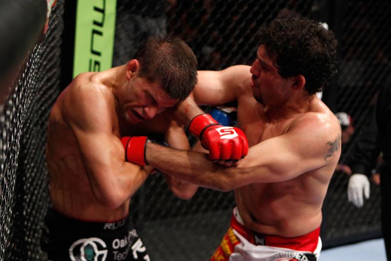 SAN JOSE, CA - MAY 19: (R-L) Gilbert Melendez elbows Josh Thomson during the Strikeforce event at HP Pavilion on May 19, 2012 in San Jose, California. (Photo by Esther Lin/Forza LLC/Zuffa LLC via Getty Images) *** Local Caption *** Gilbert Melendez; Jos