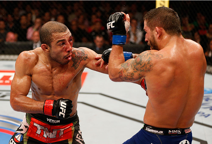 RIO DE JANEIRO, BRAZIL - OCTOBER 25: (L-R) Jose Aldo of Brazil punches Chad Mendes in their featherweight championship bout during the UFC 179 event at Maracanazinho on October 25, 2014 in Rio de Janeiro, Brazil. (Photo by Josh Hedges/Zuffa LLC/Zuffa LL