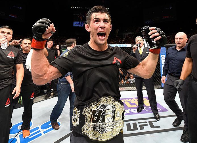 INGLEWOOD, CA - JUNE 04: Dominick Cruz celebrates after defeating Urijah Faber by unanimous decision in their UFC bantamweight championship bout during the UFC 199 event at The Forum on June 4, 2016 in Inglewood, California. (Photo by Josh Hedges/Zuffa