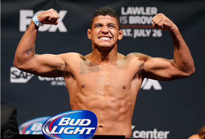 SAN JOSE, CA - JULY 25: Gilbert Burns poses on the scale after making weight during the UFC fight night weigh-in at the SAP Center on July 25, 2014 in San Jose, California. (Photo by Josh Hedges/Zuffa LLC/Zuffa LLC via Getty Images)