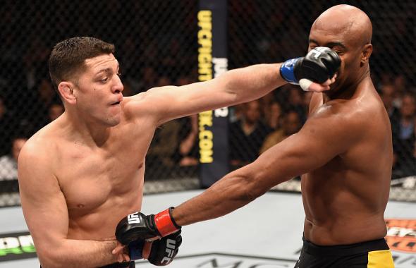 LAS VEGAS, NV - JANUARY 31: (L-R) Nick Diaz punches Anderson Silva in their middleweight bout during the UFC 183 event at the MGM Grand Garden Arena on January 31, 2015 in Las Vegas, Nevada. (Photo by Josh Hedges/Zuffa LLC)
