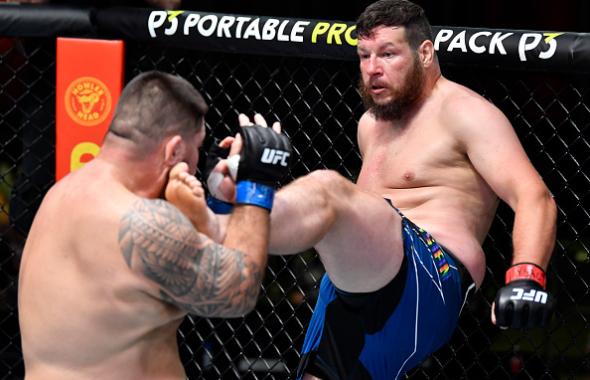 Josh Parisian kicks Roque Martinez of Guam in a heavyweight bout during the UFC Fight Night event at UFC APEX on June 19, 2021 in Las Vegas, Nevada. (Photo by Chris Unger/Zuffa LLC)