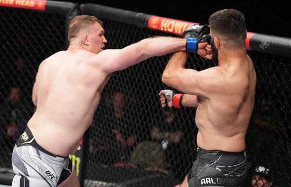  Jared Vanderaa punches Andrei Arlovski of Belarus in their heavyweight fight during the UFC 271 event at Toyota Center on February 12, 2022 in Houston, Texas. (Photo by Josh Hedges/Zuffa LLC)