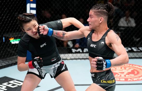 Priscila Cachoeira of Brazil punches Ji Yeon Kim of South Korea in their flyweight fight during the UFC Fight Night event at UFC APEX on February 26, 2022 in Las Vegas, Nevada. (Photo by Chris Unger/Zuffa LLC)