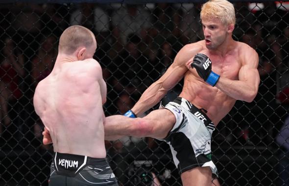 Allan Nascimento of Brazil kicks Jake Hadley of England in a flyweight fight at UFC APEX on May 14, 2022 in Las Vegas, Nevada. (Photo by Jeff Bottari/Zuffa LLC)