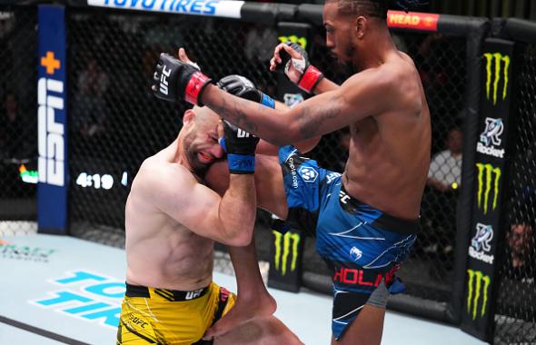 Joseph Holmes knees Alen Amedovski of Macedonia in a middleweight bout during the UFC Fight Night event at UFC APEX on May 21, 2022 in Las Vegas, Nevada. (Photo by Chris Unger/Zuffa LLC)