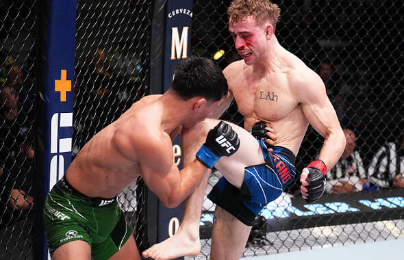 Brady Hiestand knees Fernie Garcia in a bantamweight fight during the UFC Fight Night event at UFC APEX on November 19, 2022 in Las Vegas, Nevada. (Photo by Chris Unger/Zuffa LLC)
