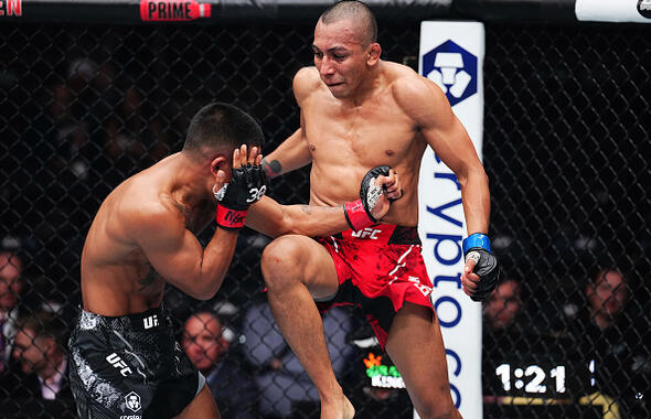 Kevin Borjas knees Joshua Van in a flyweight fight during the UFC 295 event at Madison Square Garden on November 11, 2023 in New York City. (Photo by Chris Unger/Zuffa LLC)