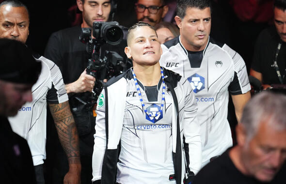 Priscila Cachoeira walks to the Octagon prior to her flyweight fight against Miranda Maverick