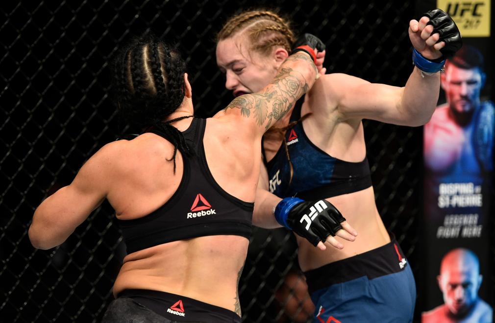 GDANSK, POLAND - OCTOBER 21: (L-R) Lina Lansberg of Sweden punches Aspen Ladd in their women's bantamweight bout during the UFC Fight Night event inside Ergo Arena on October 21, 2017 in Gdansk, Poland. (Photo by Jeff Bottari/Zuffa LLC/Zuffa LLC via Getty Images)