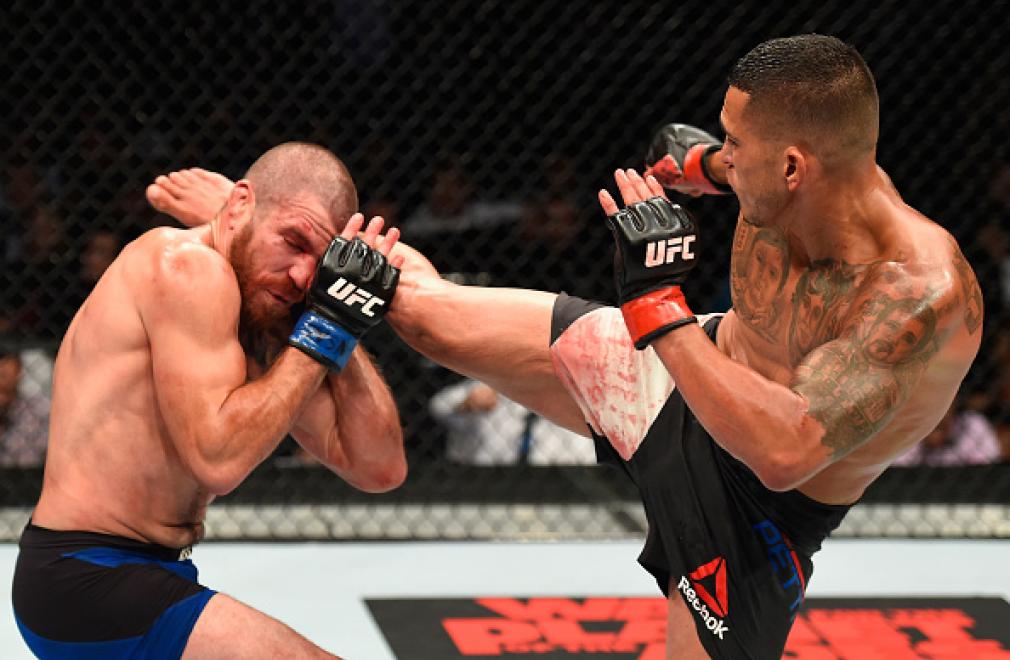 LAS VEGAS, NV - JULY 08: (R-L) Anthony Pettis kicks Jim Miller in their lightweight bout during the UFC 213 event at T-Mobile Arena on July 8, 2017 in Las Vegas, Nevada. (Photo by Josh Hedges/Zuffa LLC/Zuffa LLC via Getty Images)