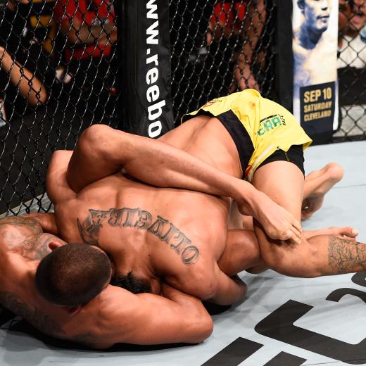 VANCOUVER, BC - AUGUST 27: (L-R) Anthony Pettis of the United States attempts to submit Charles Oliveira of Brazil in their featherweight bout during the UFC Fight Night event at Rogers Arena on August 27, 2016 in Vancouver, British Columbia, Canada. (Photo by Jeff Bottari/Zuffa LLC/Zuffa LLC via Getty Images)