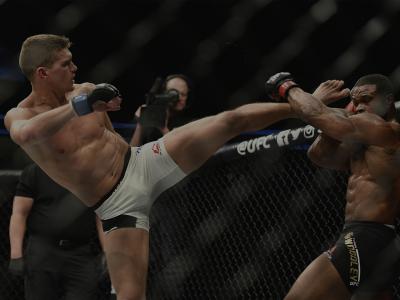 LAS VEGAS, NV - MARCH 04: (L-R) Stephen Thompson kicks Tyron Woodley in their UFC welterweight championship bout during the UFC 209 event at T-Mobile Arena on March 4, 2017 in Las Vegas, Nevada. (Photo by Jeff Bottari/Zuffa LLC/Zuffa LLC via Getty Images)