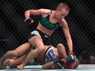 Rose Namajunas punches Paige VanZant in their women's strawweight bout during the UFC Fight Night event at The Chelsea at the Cosmopolitan of Las Vegas on December 10, 2015 in Las Vegas, Nevada. (Photo by Brandon Magnus/Zuffa LLC)