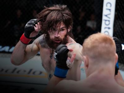 LAS VEGAS, NEVADA - MARCH 12: (L-R) Matthew Semelsberger punches AJ Fletcher in their welterweight fight during the UFC Fight Night event at UFC APEX on March 12, 2022 in Las Vegas, Nevada. (Photo by Chris Unger/Zuffa LLC)