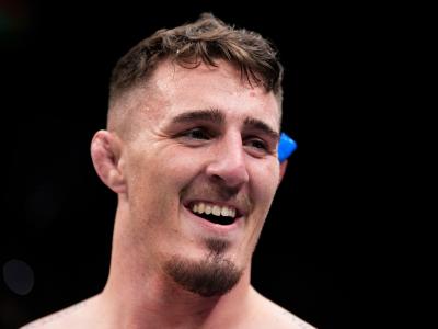 Tom Aspinall of England celebrates his submission victory over Alexander Volkov of Russia in a heavyweight fight during the UFC Fight Night event at O2 Arena on March 19, 2022 in London, England. (Photo by Chris Unger/Zuffa LLC)