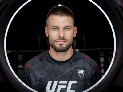 Tim Means poses in the UFC APEX Octagon ahead of his UFC Fight Night: Kattar vs Allen co-main event bout against Max Griffin