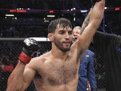 Matt Schnell reacts after his victory over Sumudaerji of China in a flyweight fight during the UFC Fight Night event at UBS Arena