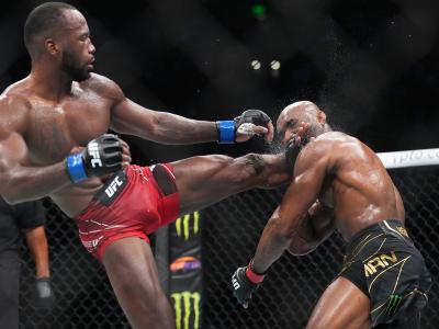 Leon Edwards of Jamaica lands a head kick to Kamaru Usman of Nigeria in the UFC welterweight championship fight during the UFC 278 event at Vivint Arena on August 20, 2022 in Salt Lake City, Utah. (Photo by Chris Unger/Zuffa LLC)