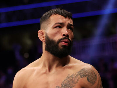 Dan Ige enters the octagon for his featherweight fight against Josh Emmett during the UFC 269 event at T-Mobile Arena on December 11, 2021 in Las Vegas, Nevada. (Photo by Carmen Mandato/Getty Images)