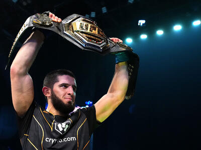 Islam Makhachev of Russia celebrates after his victory over Charles Oliveira of Brazil in their UFC lightweight championship fight during the UFC 280 event at Etihad Arena on October 22, 2022 in Abu Dhabi, United Arab Emirates. (Photo by Chris Unger/Zuffa LLC)