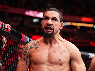  Robert Whittaker of New Zealand prepares to face Paulo Costa of Brazil in a middleweight fight during the UFC 298 event at Honda Center on February 17, 2024 in Anaheim, California