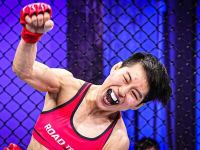 Wang Cong of China reacts after her submission victory against Paula Luna of Peru in a flyweight fight during the Road to UFC 3 event at the UFC Performance Institute on May 18, 2024 in Shanghai, China