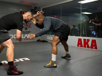 SAN JOSE, CA - JANUARY 05:  (L-R) Cain Velasquez works out  with light heavyweight champion Daniel Cormier during a media day at American Kickboxing Academy on January 5, 2016 in San Jose, California.  (Photo by Brandon Magnus/Zuffa LLC/Zuffa LLC via Gett