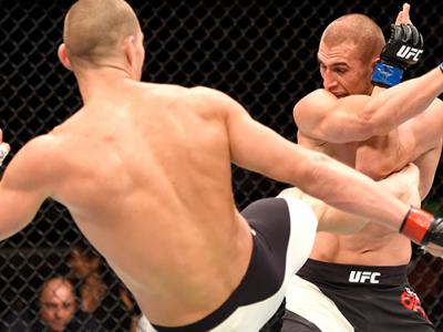 INGLEWOOD, CA - JUNE 04: Sean Strickland kicks Tom Breese of England in their welterweight bout during the UFC 199 event at The Forum on June 4, 2016 in Inglewood, California. (Photo by Josh Hedges/Zuffa LLC/Zuffa LLC via Getty Images)
