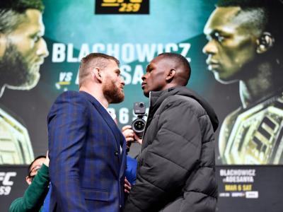 LAS VEGAS, NEVADA - MARCH 04: (L-R) Opponents Jan Blachowicz of Poland and Israel Adesanya of Nigeria face off during the UFC 259