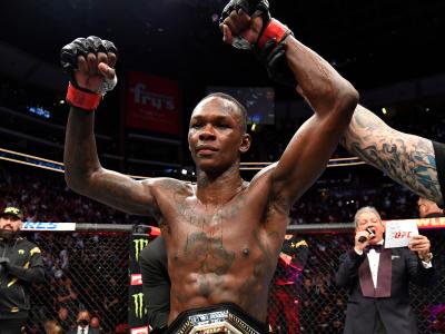 Israel Adesanya of Nigeria reacts after his victory over Marvin Vettori of Italy in their UFC middleweight championship fight during the UFC 263 event at Gila River Arena on June 12, 2021 in Glendale, Arizona. (Photo by Jeff Bottari/Zuffa LLC)