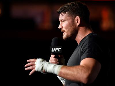 MANCHESTER, ENGLAND - OCTOBER 05:   Michael Bisping of England interacts with fans and media after an open training session for fans and media at the Manchester Arena on October 5, 2016 in Manchester, England. (Photo by Josh Hedges/Zuffa LLC/Zuffa LLC via