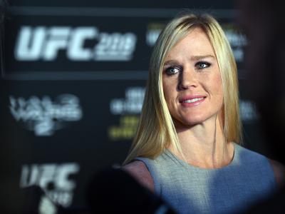 BROOKLYN, NY - FEBRUARY 08: Holly Holm interacts with the media during the UFC 208 Ultimate Media Day at the Barclays Center on February 8, 2017 in Brooklyn, New York. (Photo by Jeff Bottari/Zuffa LLC/Zuffa LLC via Getty Images)