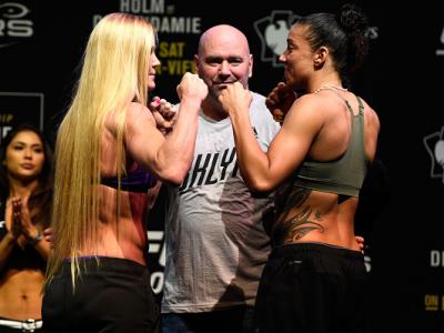 BROOKLYN, NEW YORK - FEBRUARY 10:  (L-R) Holly Holm and Germaine de Randamie of The Netherlands face off during the UFC 208 weigh-in inside Kings Theater on February 10, 2017 in Brooklyn, New York. (Photo by Jeff Bottari/Zuffa LLC/Zuffa LLC via Getty Imag