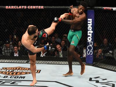 BROOKLYN, NEW YORK - FEBRUARY 11:  (L-R) Belal Muhammad kicks Randy Brown of Jamaica in their welterweight bout during the UFC 208 event inside Barclays Center on February 11, 2017 in Brooklyn, New York. (Photo by Jeff Bottari/Zuffa LLC/Zuffa LLC via Gett