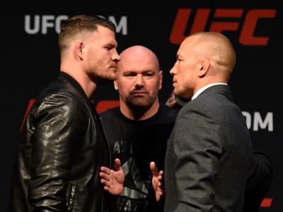 LAS VEGAS, NV - MARCH 03:  (L-R) UFC middleweight champion Michael Bisping of England faces off against Georges St-Pierre of Canada during the UFC press conference at T-Mobile arena on March 3, 2017 in Las Vegas, Nevada. (Photo by Josh Hedges/Zuffa LLC/Zu