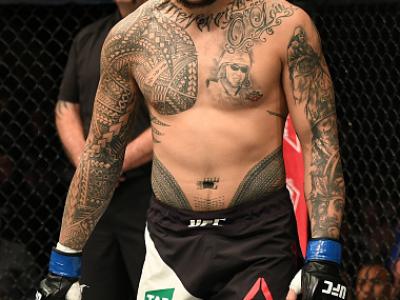 MELBOURNE, AUSTRALIA - NOVEMBER 27:   Tyson Pedro of Australia stands in the Octagon before his light heavyweight bout against Khalil Rountree during the UFC Fight Night event at Rod Laver Arena on November 27, 2016 in Melbourne, Australia. (Photo by Jeff